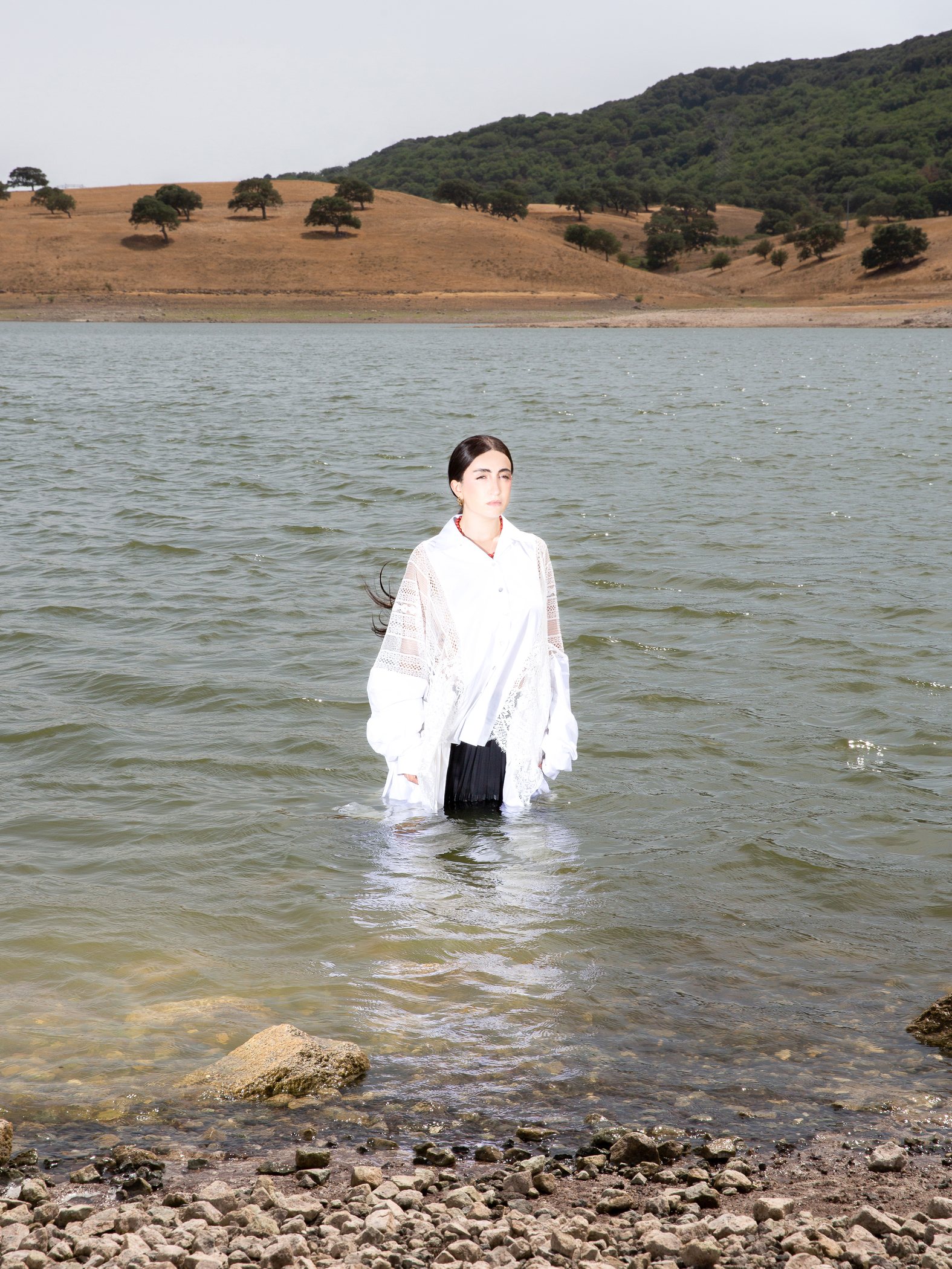 BLUEM editorial image by the water