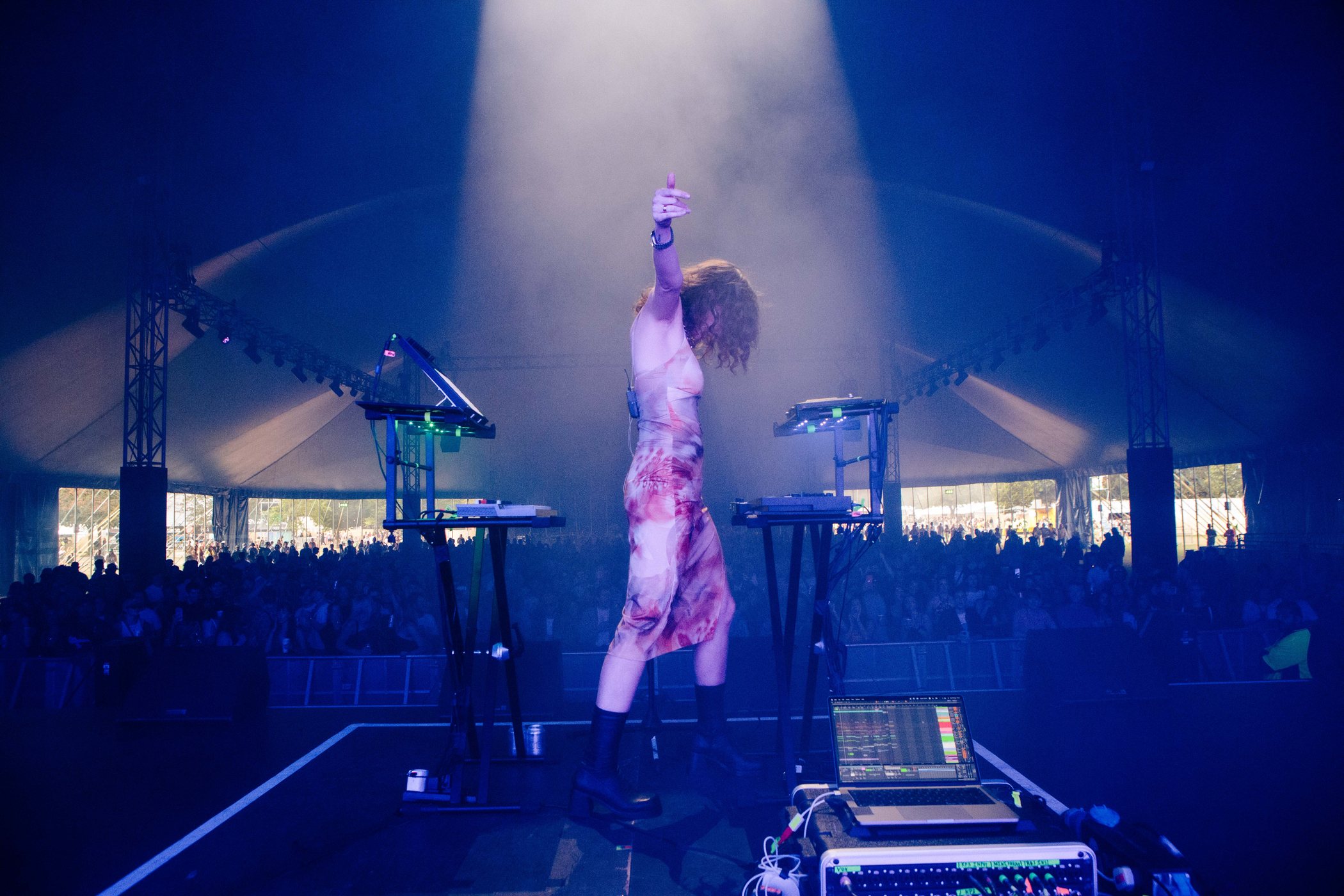 Blue-lit stage and crowd